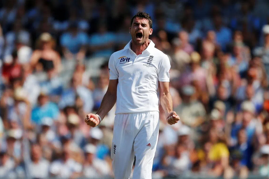 FILE PHOTO: England's Jimmy Anderson reacts after believing he had taken the wicket of Australia's Steve Smith during the first day of the third Ashes test cricket match at Old Trafford cricket ground in Manchester, northern England August 1, 2013. REUTERS/Phil Noble/File Photo