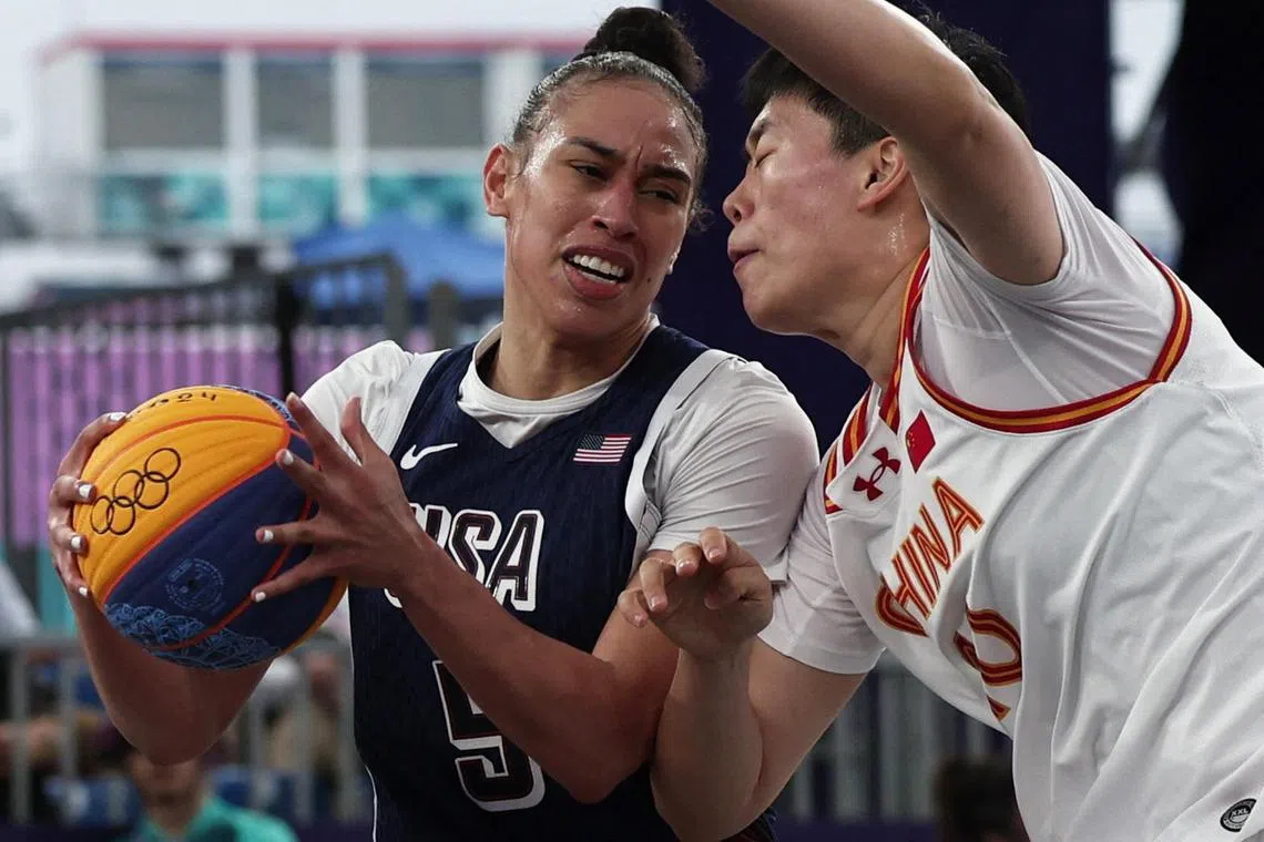 Dearica Hamby of United States in action against China at the Paris Olympics.