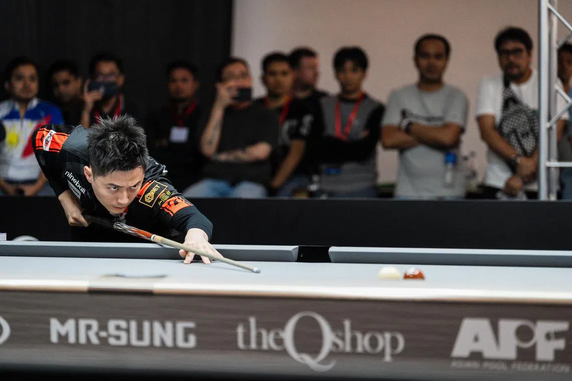 Taiwanese Ko Ping-yi retains his TE Capital APP 9-Ball title with a 13-6 win over Philippine starlet Albert Manas at the Aspire Recreation Centre at HarbourFront Centre on Dec 3.