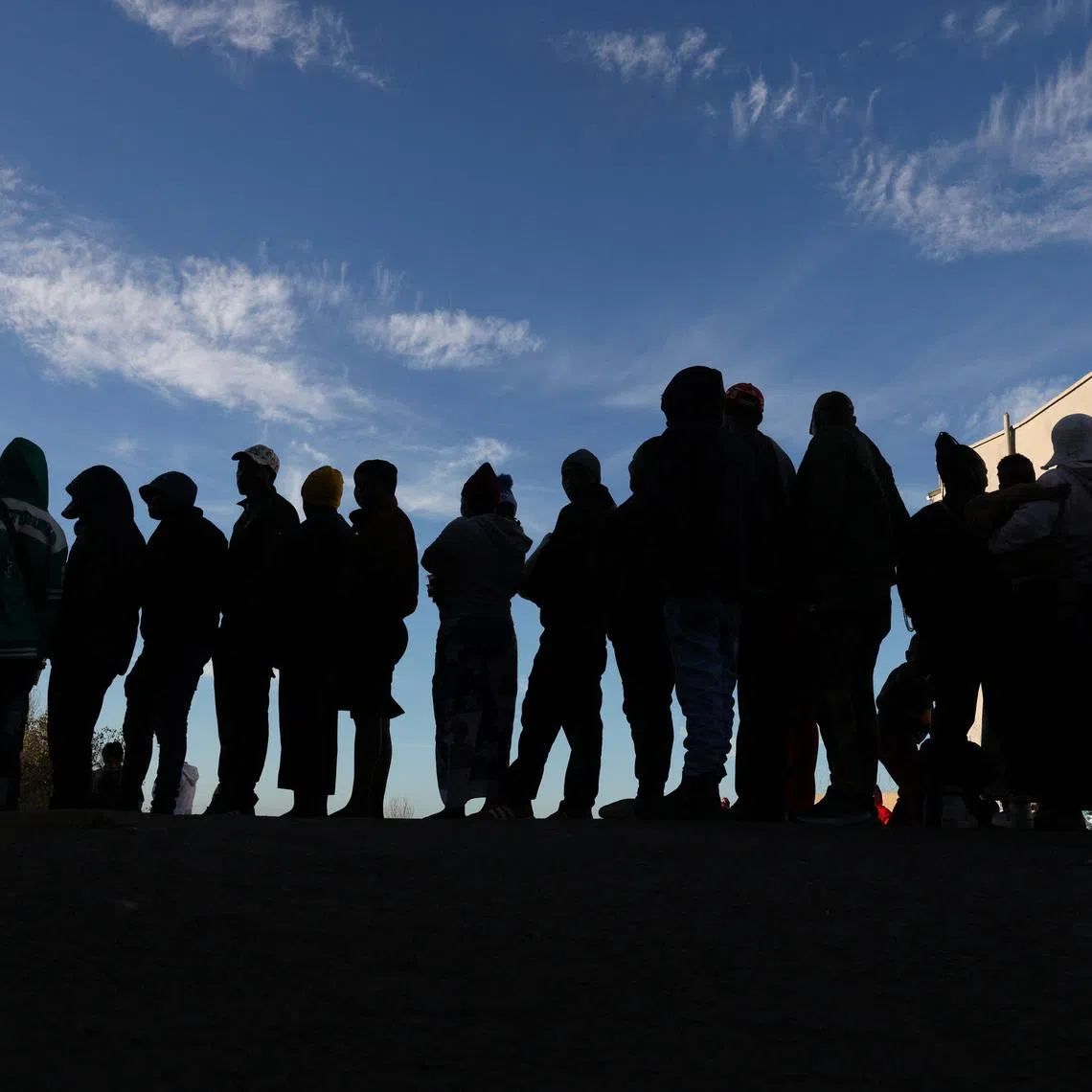 Zimbabwean migrants queue outside the Zimbabwe Consulate amid fears of anti-immigrant violence ahead of a June 30 deadline set by activists demanding undocumented migrants leave the country, in Cape Town, South Africa, June 24, 2026. REUTERS/Esa Alexander