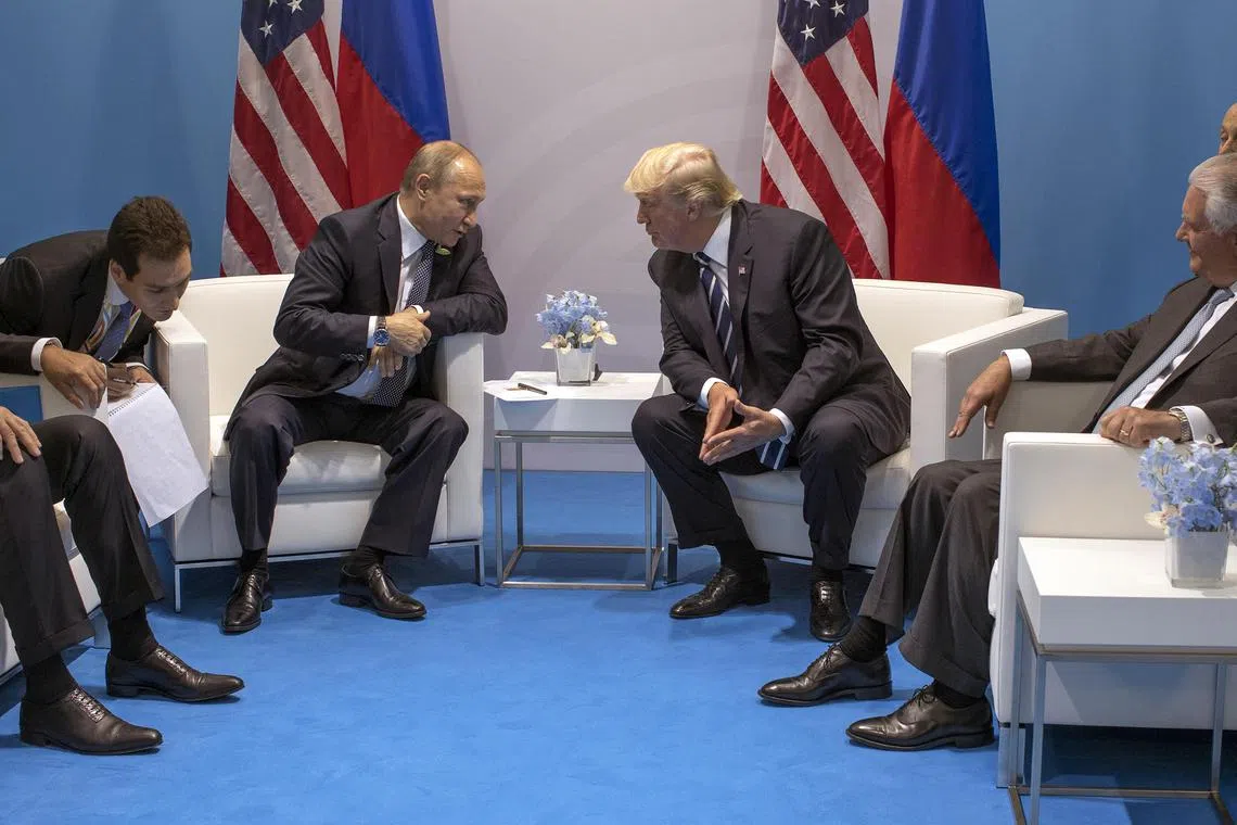HEADLINE: Putin Seized Opportunity to Use TrumpÕs Grudge Against Ukraine
CAPTION: FILE Ñ Then-President  Donald Trump, center right, meets with President Vladimir Putin of Russia, center left, at the Group of 20 summit in Hamburg, Germany, on July 7, 2017. The meeting in Hamburg fit into a yearlong pattern in which an escalating political grudge against Ukraine on TrumpÕs part became an opening for Putin to pursue his own aim of tempering American support for Kyiv. 
CREDIT: (Stephen Crowley/The New York Times)