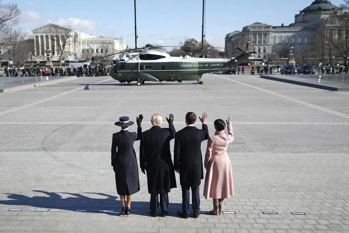 First lady Melania Trump, President Donald Trump, Vice President JD Vance and second lady Usha Vance waving as former President Joe Biden and former first lady Jill Biden depart the Capitol after Trump’s inauguration ceremony on Jan 20, 2025. 