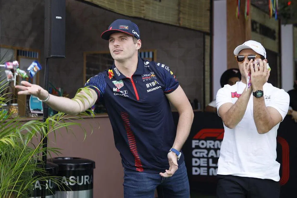 Formula One F1 - Mexico City Grand Prix - Autodromo Hermanos Rodriguez, Mexico City, Mexico - October 26, 2023 Red Bull's Max Verstappen and Sergio Perez ahead of the Mexico City Grand Prix REUTERS/Raquel Cunha
