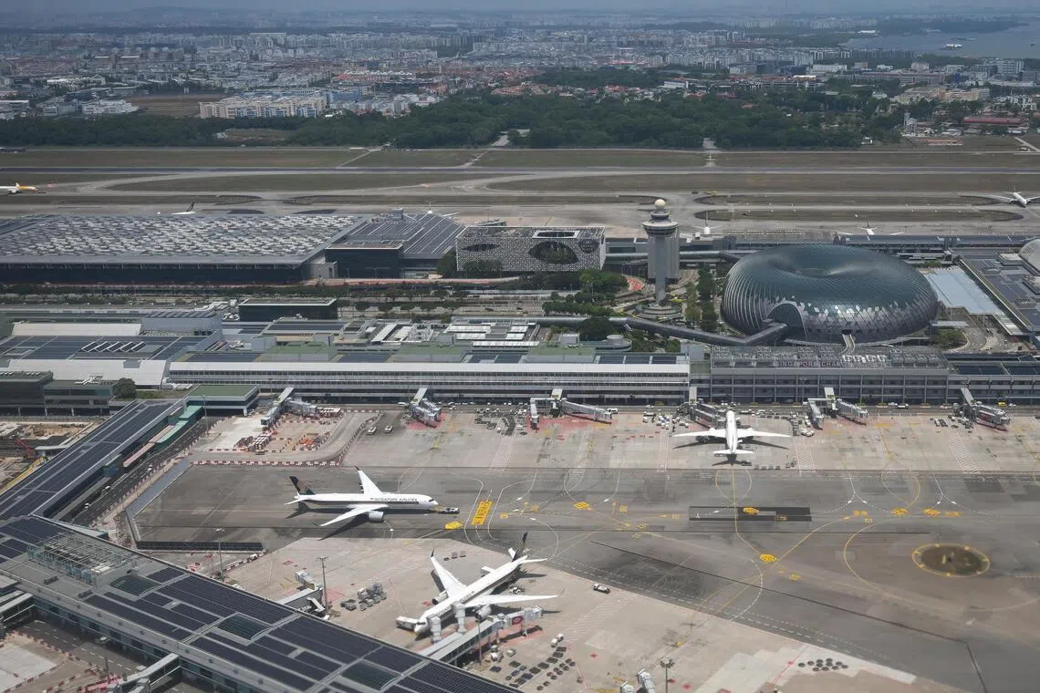 Jewel Changi Airport and the airport control tower seen from a plane on Mar 24, 2026.