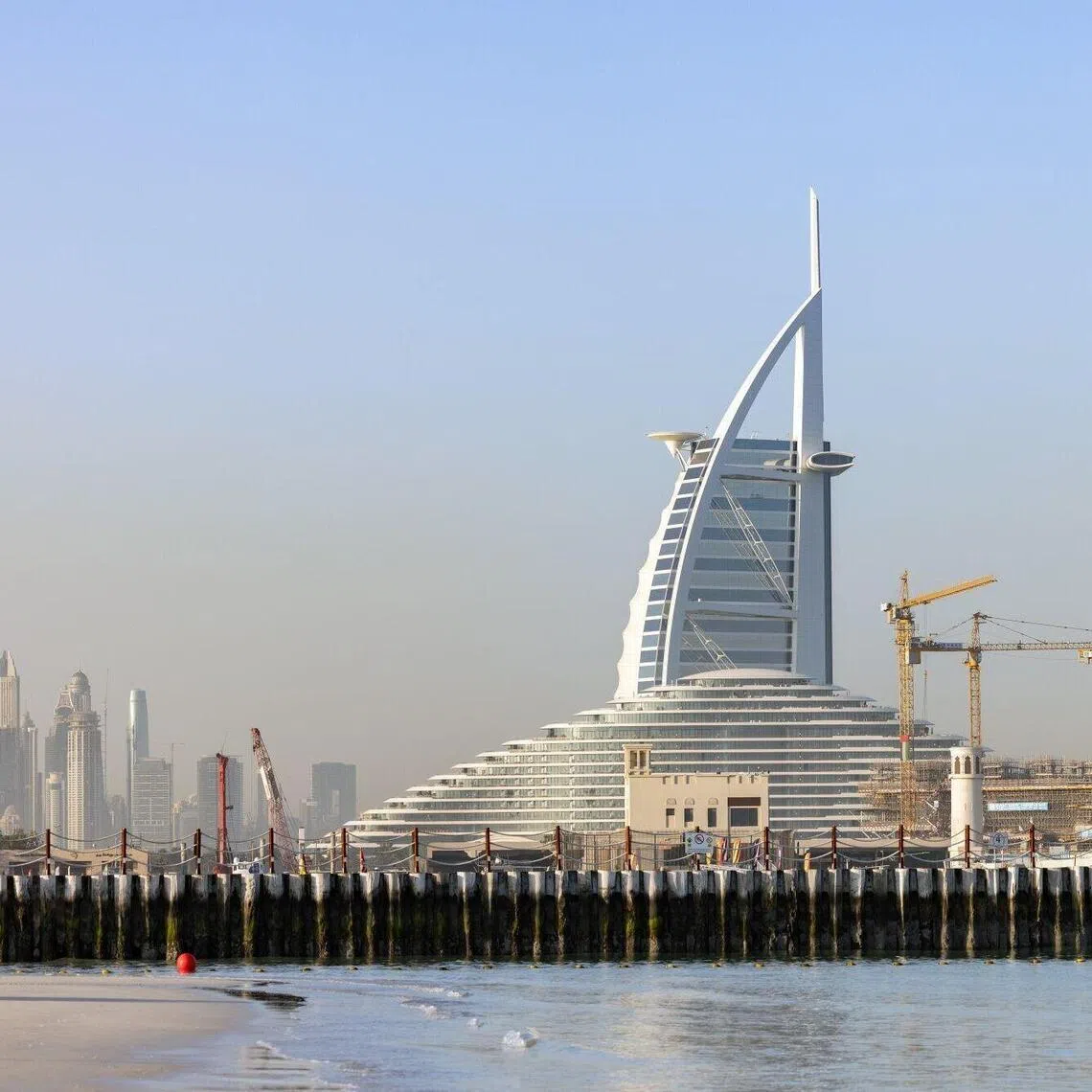 Burj Al Arab Hotel in Dubai. Falling debris from an intercepted drone caused a minor fire on the outer facade. 