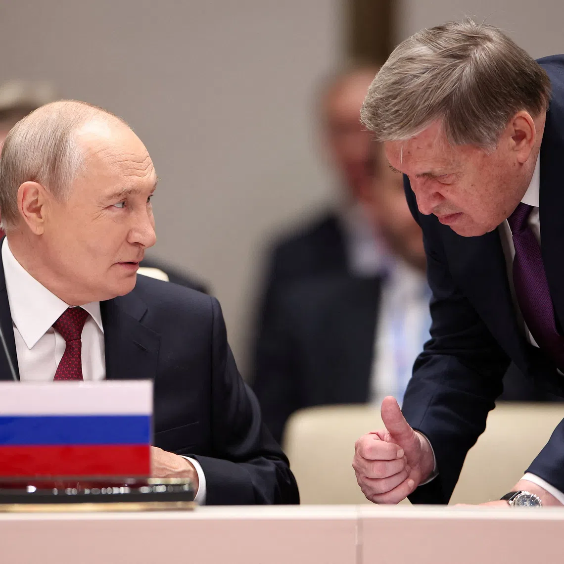 Russian President Vladimir Putin talks to his aide Yury Ushakov before a session of the Shanghai Cooperation Organisation (SCO) summit in Bishkek, Kyrgyzstan September 1, 2026. Sputnik/Petr Kovalev/Pool via REUTERS
