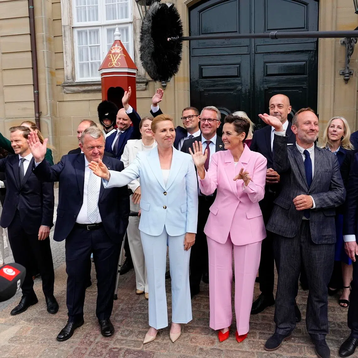 Danish Prime Minister Mette Frederiksen (centre) with her new Cabinet members at Amalienborg Castle in Copenhagen on June 3. Eleven out of the 21 ministers are women.