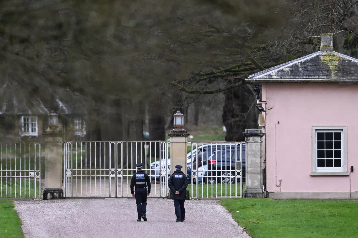 Police officers at the entrance of the Royal Lodge, a property on the estate surrounding Windsor Castle and a former residence of Andrew Mountbatten-Windsor, younger brother of Britain's King Charles, formerly known as Prince Andrew, in Windsor, Britain, February 20, 2026. REUTERS/Jaimi Joy/File Photo