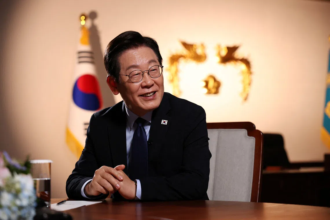 South Korean President Lee Jae Myung reacts during an interview with Reuters at the Presidential Office in Seoul, South Korea, September 19, 2025.   REUTERS/Kim Hong-Ji