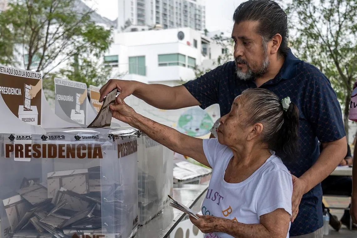 Citizens vote in the Mexican general elections at a polling station, in the city of Monterrey, in Nuevo Leon, Mexico, on June 2. 