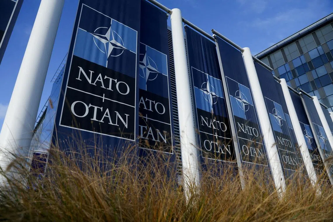 FILE PHOTO: Banners hang outside the NATO headquarters ahead of the a meeting of the alliance's foreign ministers, in Brussels, Belgium November 28, 2023. REUTERS/Yves Herman/File Photo