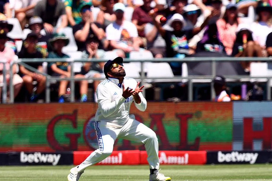 Cricket - Second Test - South Africa v India - Newlands Cricket Ground, Cape Town, South Africa - January 4, 2024 India's Rohit Sharma catches out South Africa's Aiden Markram REUTERS/Esa Alexander