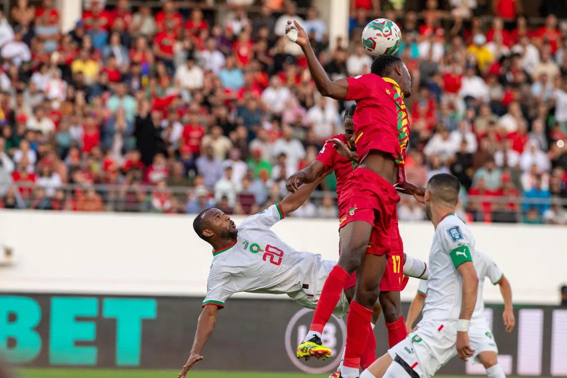 Morocco's Ayoub El Kaabi (left) and Hakim Ziyech challenging Moussavou Dechan of Congo in their World Cup 2026 qualifier in Agadir, Morocco, on June 11, 2024.