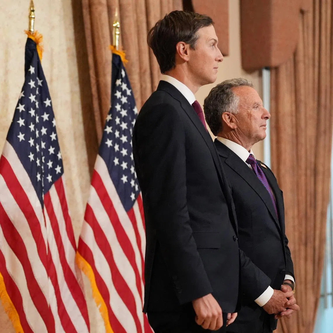 Jared Kushner and Steve Witkoff, Special Envoy for Peace Missions listen as Vice President JD Vance (not pictured) speaks during a news conference after meeting with representatives from Pakistan and Iran, Sunday, April 12, 2026, in Islamabad, Pakistan. Jacquelyn Martin/Pool via REUTERS
