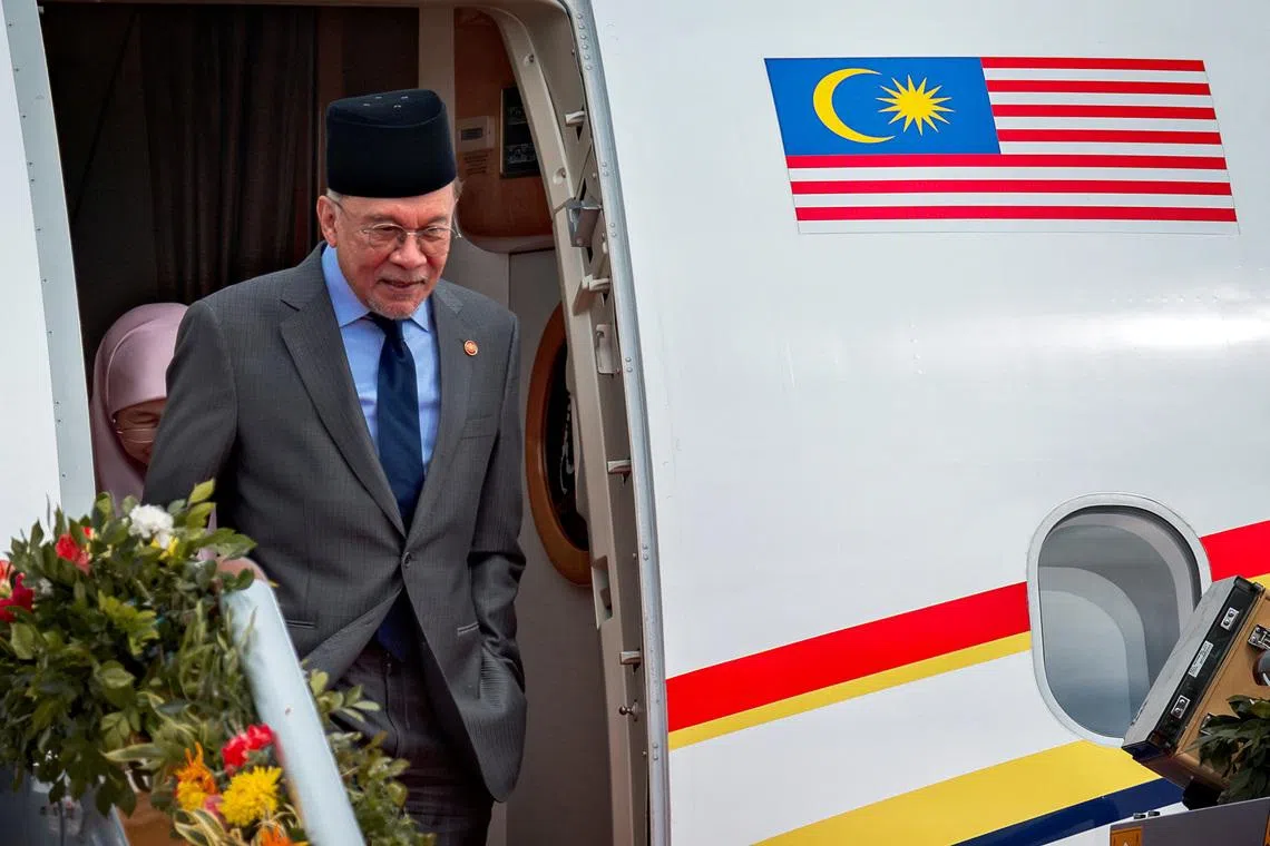 Malaysia’s Anwar facing crucial test of support as two states call early elections