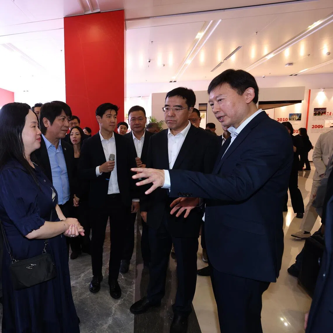 National Development Minister Chee Hong Tat (right) at the SUTD Eco-City Research and Innovation Centre in Tianjin Eco-City on Sept 17.