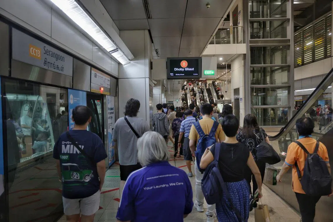 Passengers alighting at Serangoon MRT station on the Circle Line after normal train service resumed at 5pm on March 5.