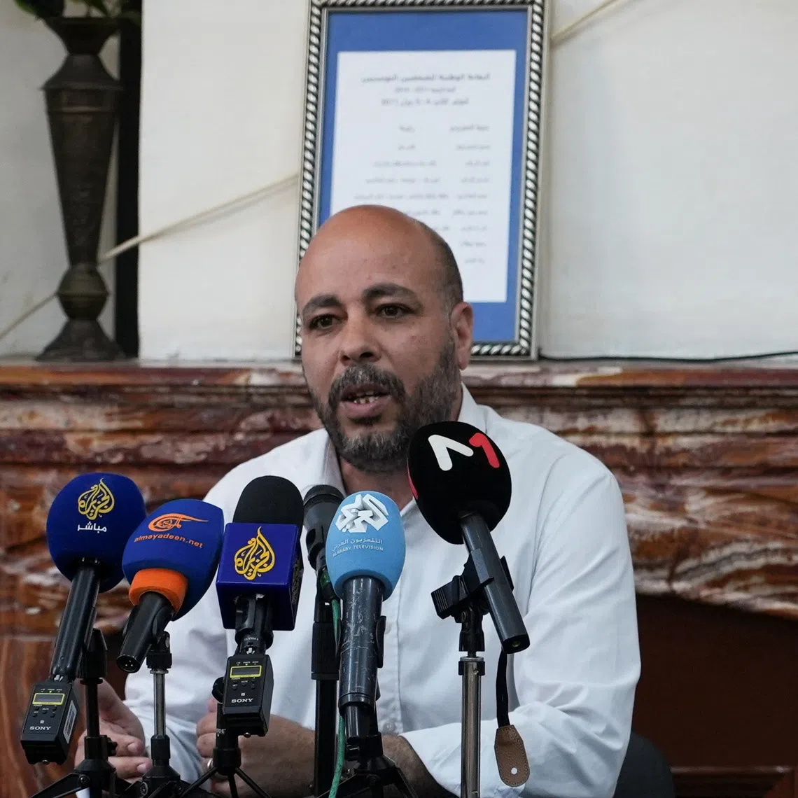 Romdhane Ben Amor of the Tunisian Forum for Economic and Social Rights, an independent advocacy group attends a press conference in Tunis, Tunisia May 9, 2025. REUTERS/Stringer