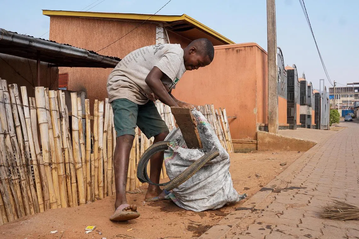 ntubkclean - A boy picks up rubbish on the roadside during Umuganda. Umuganda happens on the last Saturday of every month, from 8am to 11am. 

PHOTO: BRYAN KOW