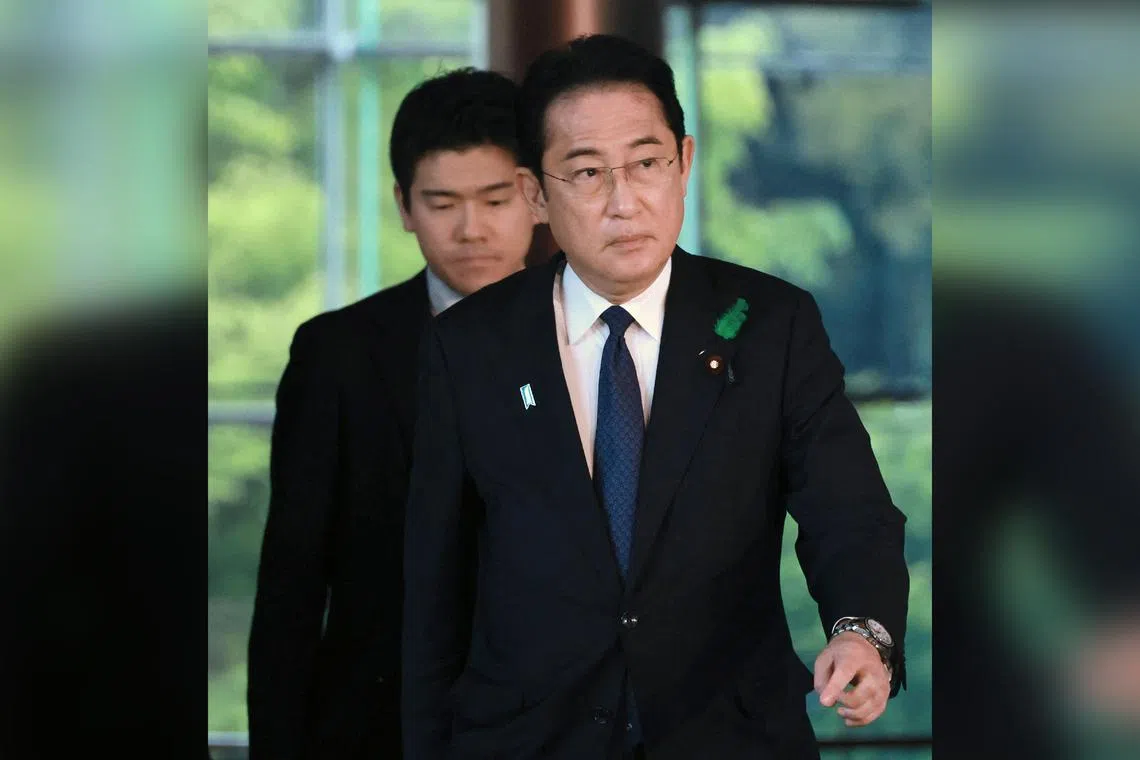 Japan's Prime Minister Fumio Kishida's eldest son Shotaro Kishida (left) lasted just seven months in the job.