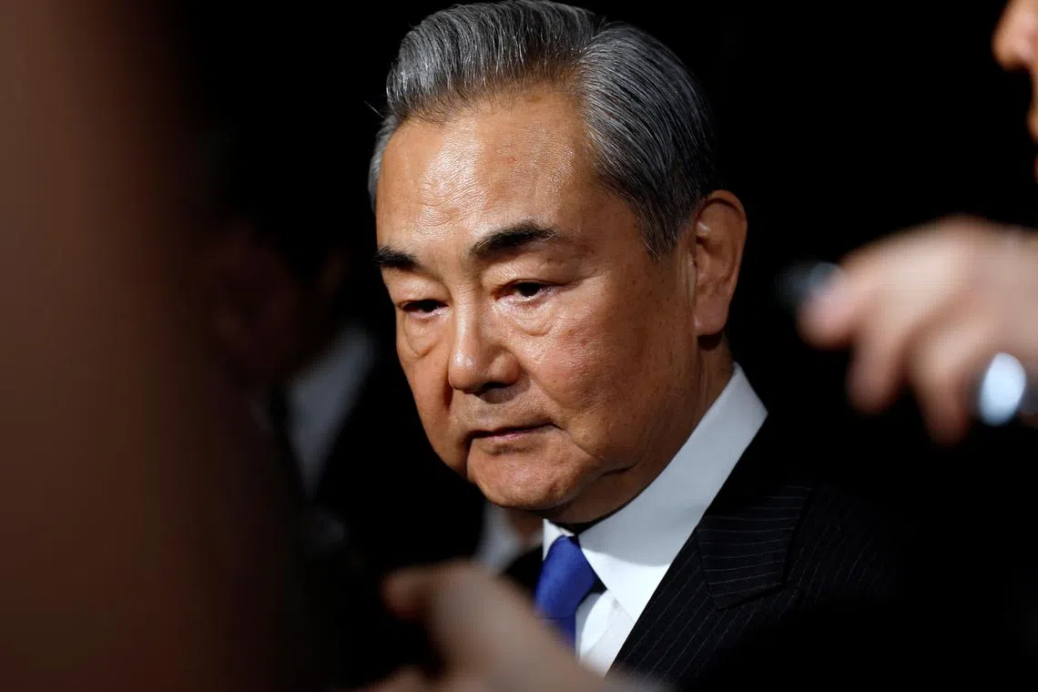 FILE PHOTO: Chinese Foreign Minister Wang Yi meets the press after his meeting with Japanese Prime Minister Shigeru Ishiba at the prime minister’s official residence in Tokyo, Japan, 21 March 2025. FRANCK ROBICHON/Pool via REUTERS/File Photo
