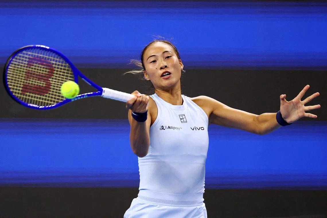 FILE PHOTO: Tennis - China Open - The Beijing Olympic Green Tennis Center, Beijing, China - September 29, 2025 China's Qinwen Zheng in action during her round of 32 match against Czech Republic's Linda Noskova. REUTERS/Tingshu Wang/File Photo