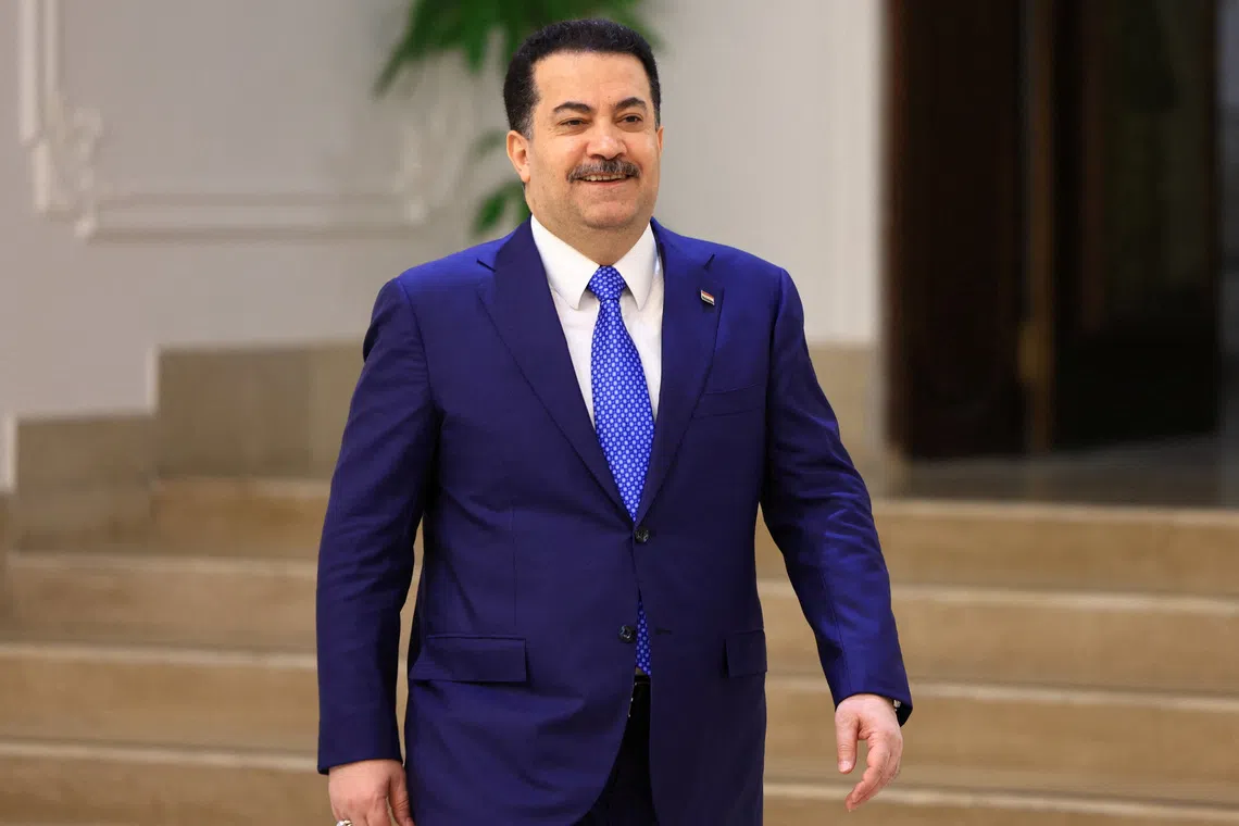 Iraqi Prime Minister Mohammed Shia al-Sudani walks before an interview with Reuters in Baghdad, Iraq November 3, 2025. REUTERS/Thaier Al-Sudani