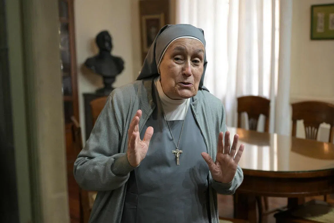 Mother Teresa Rovira gestures during an interview at the Nuestra Señora de la Misericordia School, where the late Pope Francis took his first communion, in Buenos Aires on April 21, 2025. Pope Francis died on April 21, 2025 aged 88, a day after making a much hoped-for appearance at Saint Peter's Square on Easter Sunday, the Vatican said in a statement. (Photo by JUAN MABROMATA / AFP)