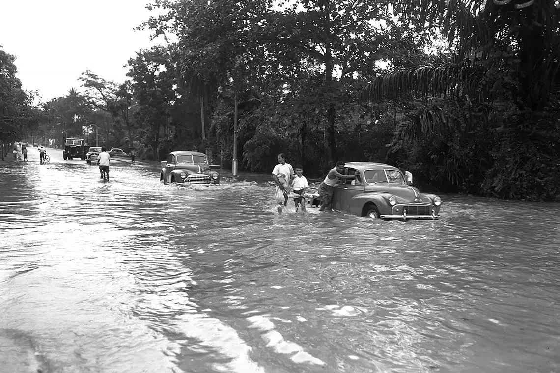 On Feb 20, 1953, 100mm of rain reportedly fell in two hours in Singapore, causing widespread floods and chaos, including in Scotts Road (above).