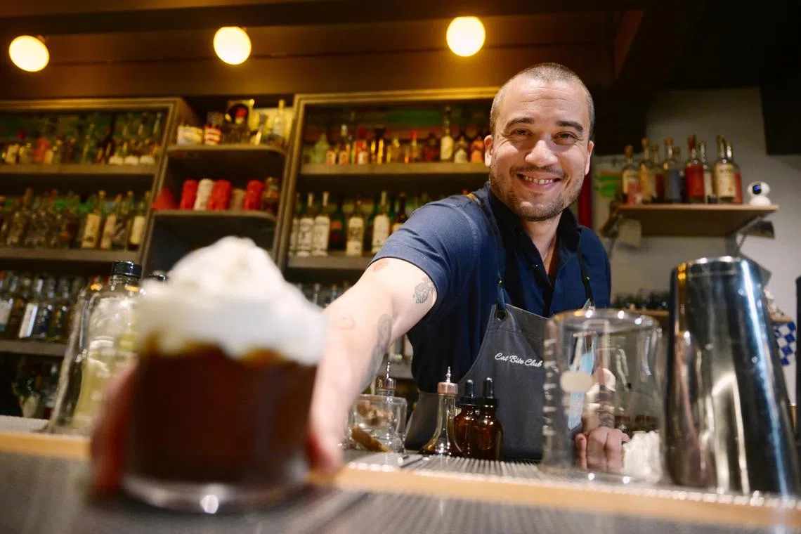 ST20241128_202477200872 kxbar Azmi Athni/Teo Kai Xiang//

Cat Bite Club founder Jesse Vida at his bar at Duxton Road on Nov 28, 2024, for Your Favourite Bar's Favourite Bar. 

ST PHOTO: AZMI ATHNI