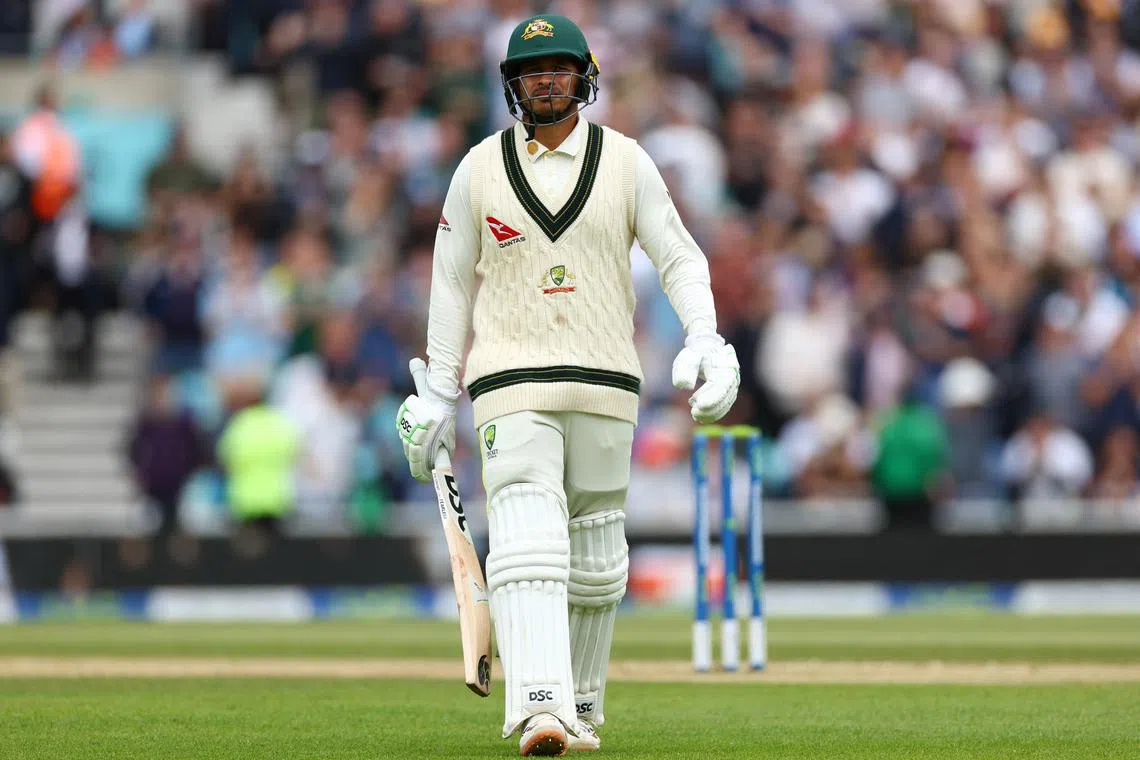 Cricket - Ashes - Fifth Test - England v Australia - The Oval, London, Britain - July 31, 2023 Australia's Usman Khawaja walks after losing his wicket, lbw bowled by England's Chris Woakes Action Images via Reuters/Andrew Boyers/File Photo