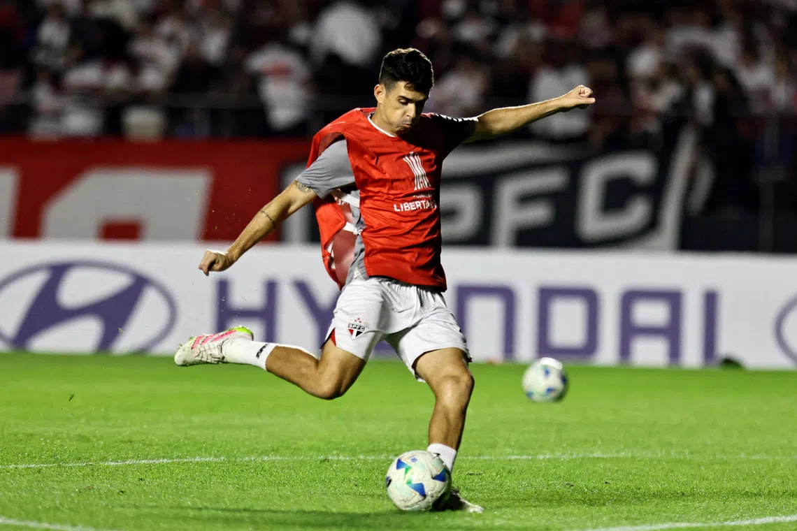 FILE PHOTO: Sao Paulo's Oscar during a game warm-up in May, 2025 REUTERS/Thiago Bernardes/File Photo