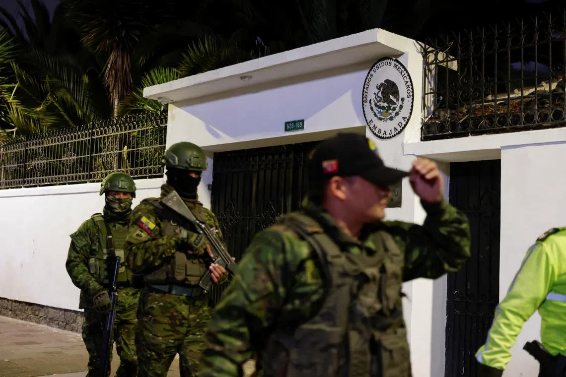 FILE PHOTO: Military officials walk outside the Mexican embassy from where they forcibly removed the former Ecuador Vice President Jorge Glas in Quito, Ecuador April 5, 2024. REUTERS/Karen Toro/File Photo