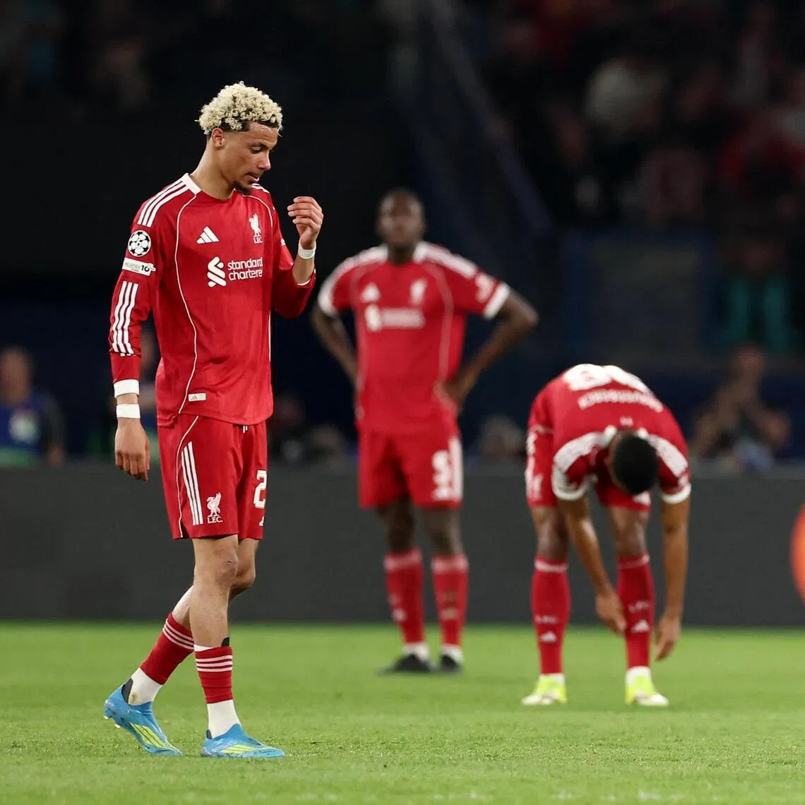 Liverpool's Hugo Ekitike looking dejected on April 9, after Paris St Germain's Khvicha Kvaratskhelia scored their second goal 