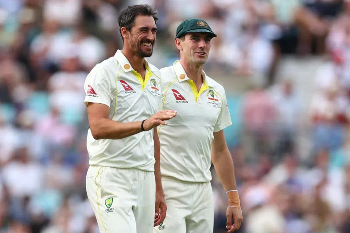 FILE PHOTO: Cricket - Ashes - Fifth Test - England v Australia - The Oval, London, Britain - July 29, 2023  Australia's Mitchell Starc celebrates with Pat Cummins after taking the wicket of England's Chris Woakes caught by Usman Khawaja Action Images via Reuters/Andrew Boyers/FILE PHOTO