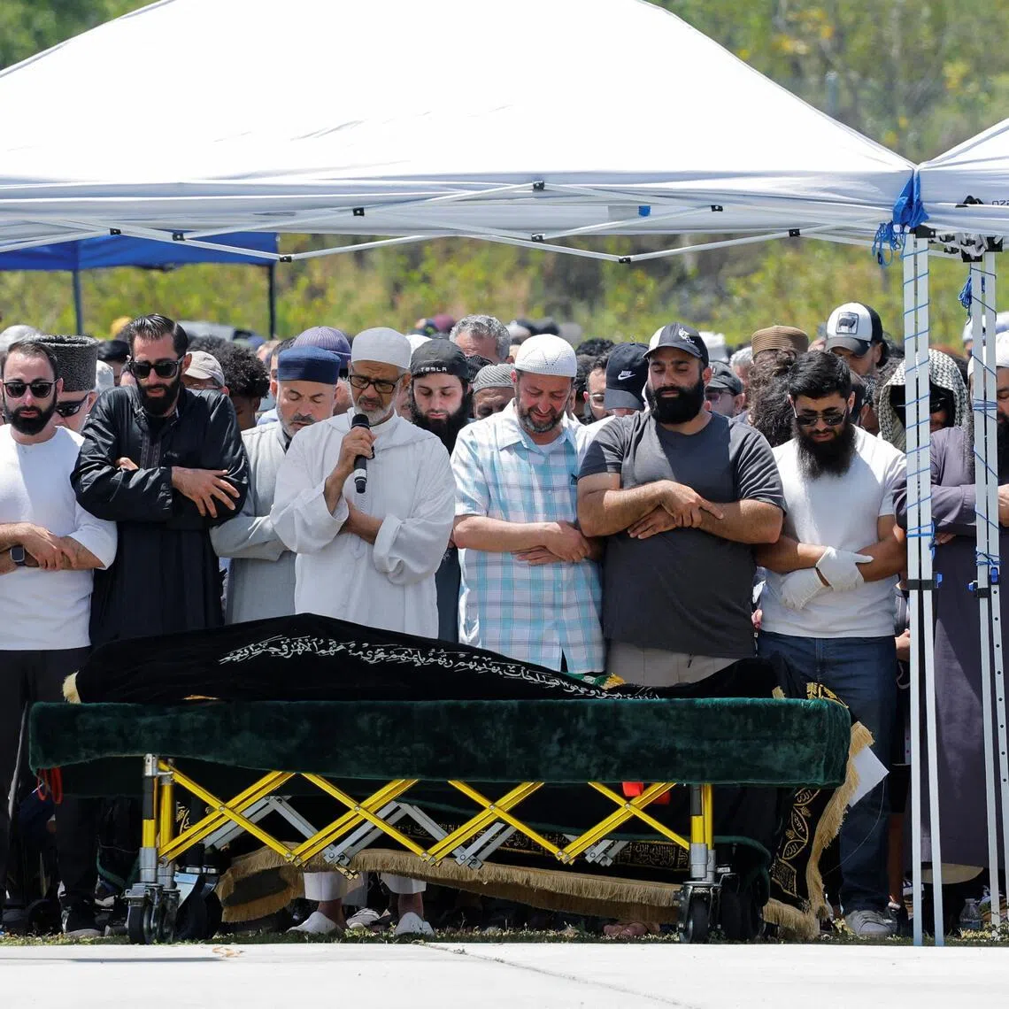 People attend a prayer service for the victims of a shooting at the Islamic Center, in San Diego, California, on May 21.