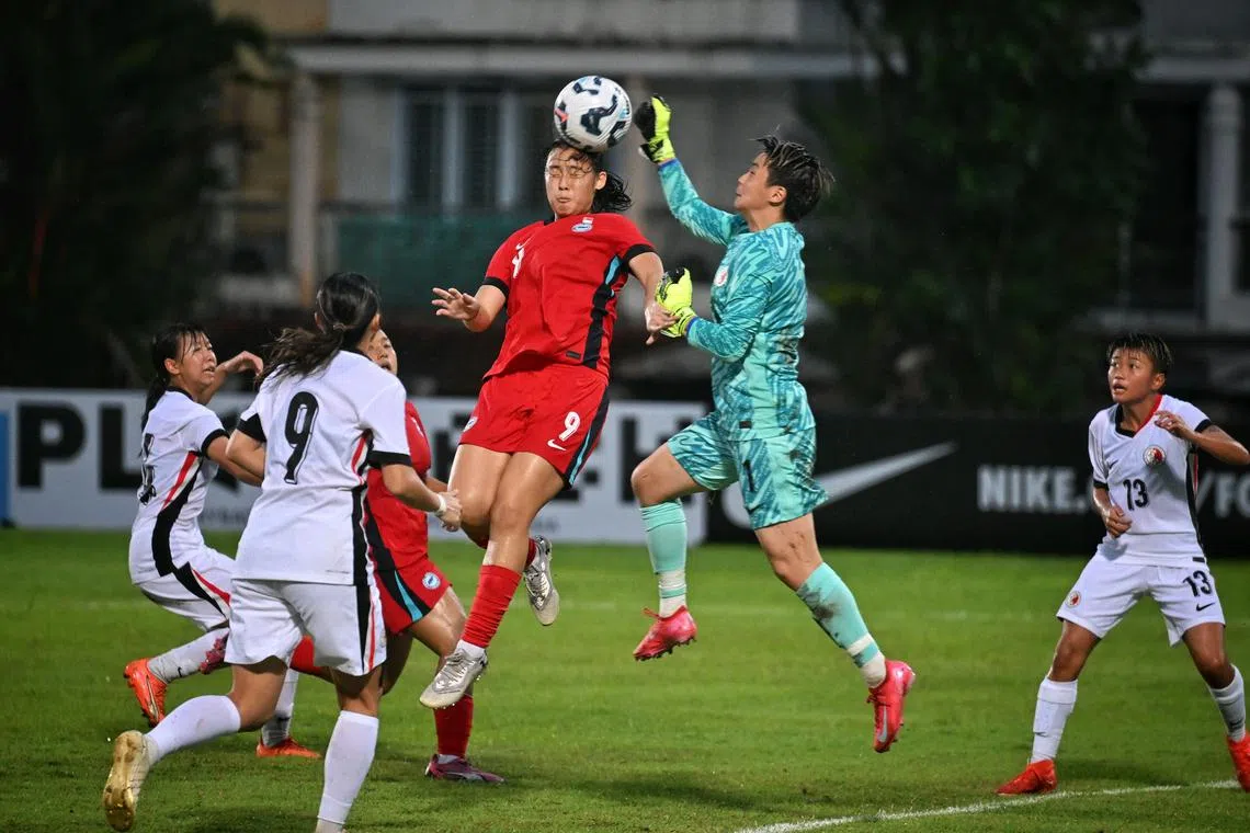 Singapore's Danelle Tan (in red), who has played in multiple clubs abroad,  is trying to elevate her game.