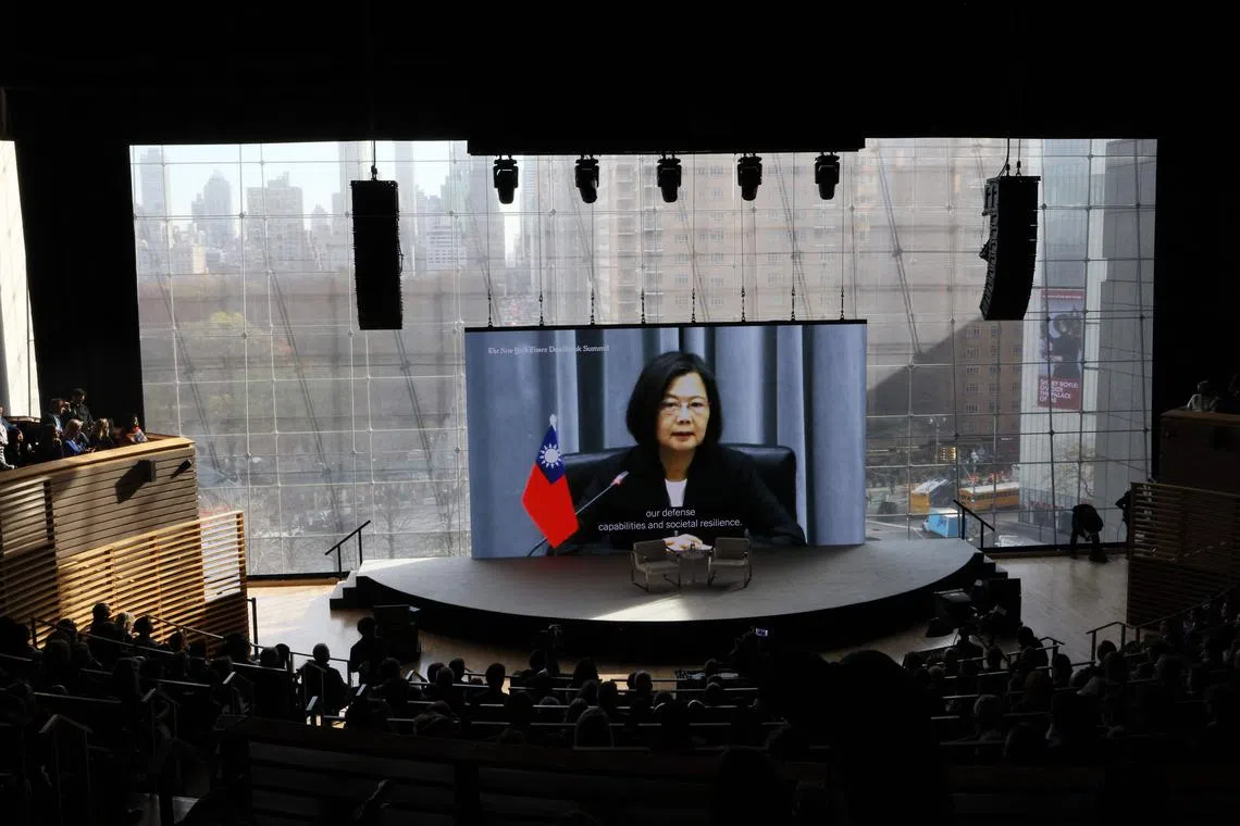 An interview between New York Times columnist Andrew Ross Sorkin and Taiwan President Tsai Ing-wen is displayed on a screen, during the New York Times annual DealBook summit.