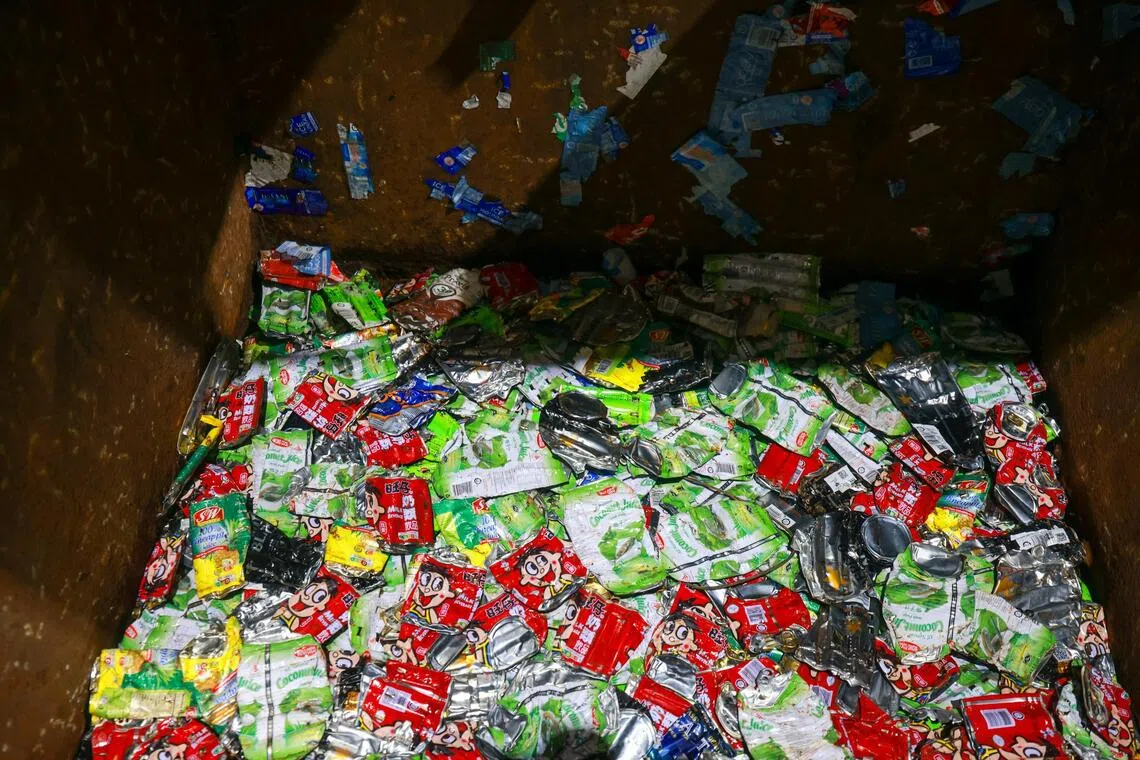 Steel cans being sorted out through magnets.