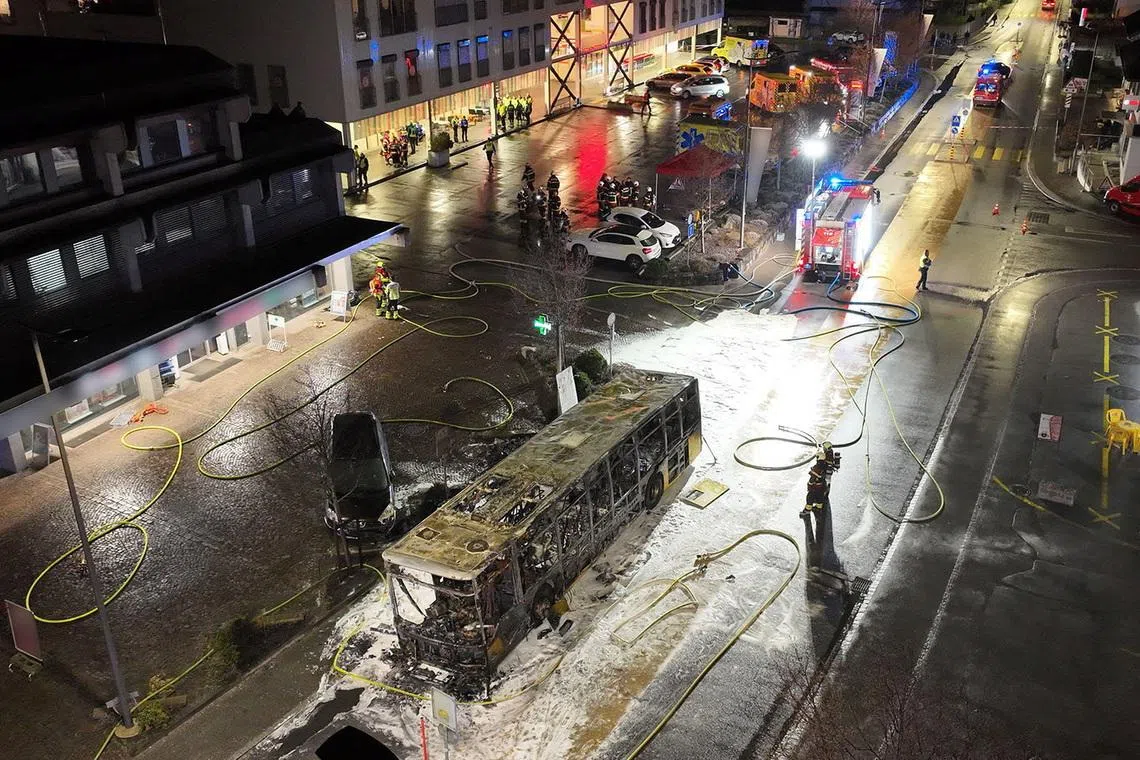 Emergency personnel work at the site of a deadly bus fire in Kerzers, Switzerland, March 10, 2026. STATE OF FREIBURG/Handout via REUTERS