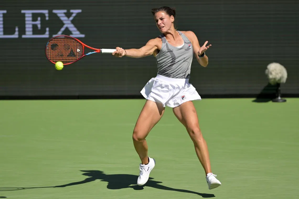 Mar 13, 2024; Indian Wells, CA, USA; Emma Navarro (USA) hits a shot in her fourth round match as she defeated Aryna Sabalenka (RUS) in the BNP Paribas Open at the Indian Wells Tennis Garden. Mandatory Credit: Jayne Kamin-Oncea-USA TODAY Sports