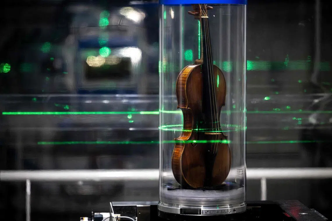 This photograph taken on March 11, 2024 shows the world's most famous violin, "Il Cannone", made in 1743 and played by the great virtuoso Niccolo Paganini, being examined by a synchrotron during a non-destructive X-ray analysis carried out by ESRF scientists (European Synchrotron Radiation Facility) in Grenoble. 