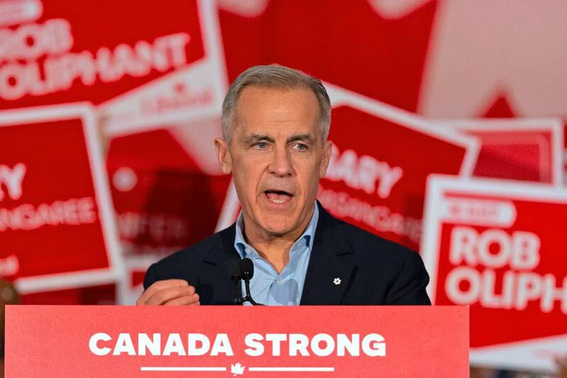 Canada's PM Mark Carney speaks during a campaign rally at the Metropolitan Centre in Toronto, Ontario.