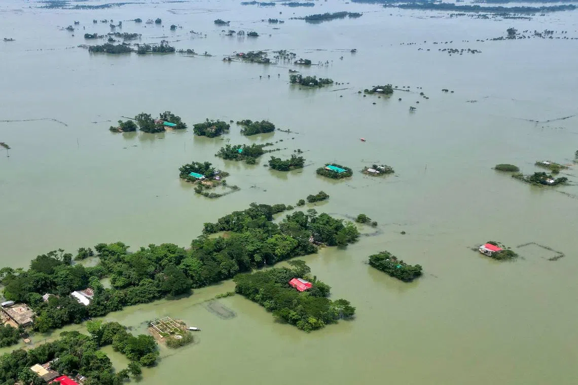 An aerial view shows deluged land after flood in Sylhet on June 21, 2024. 