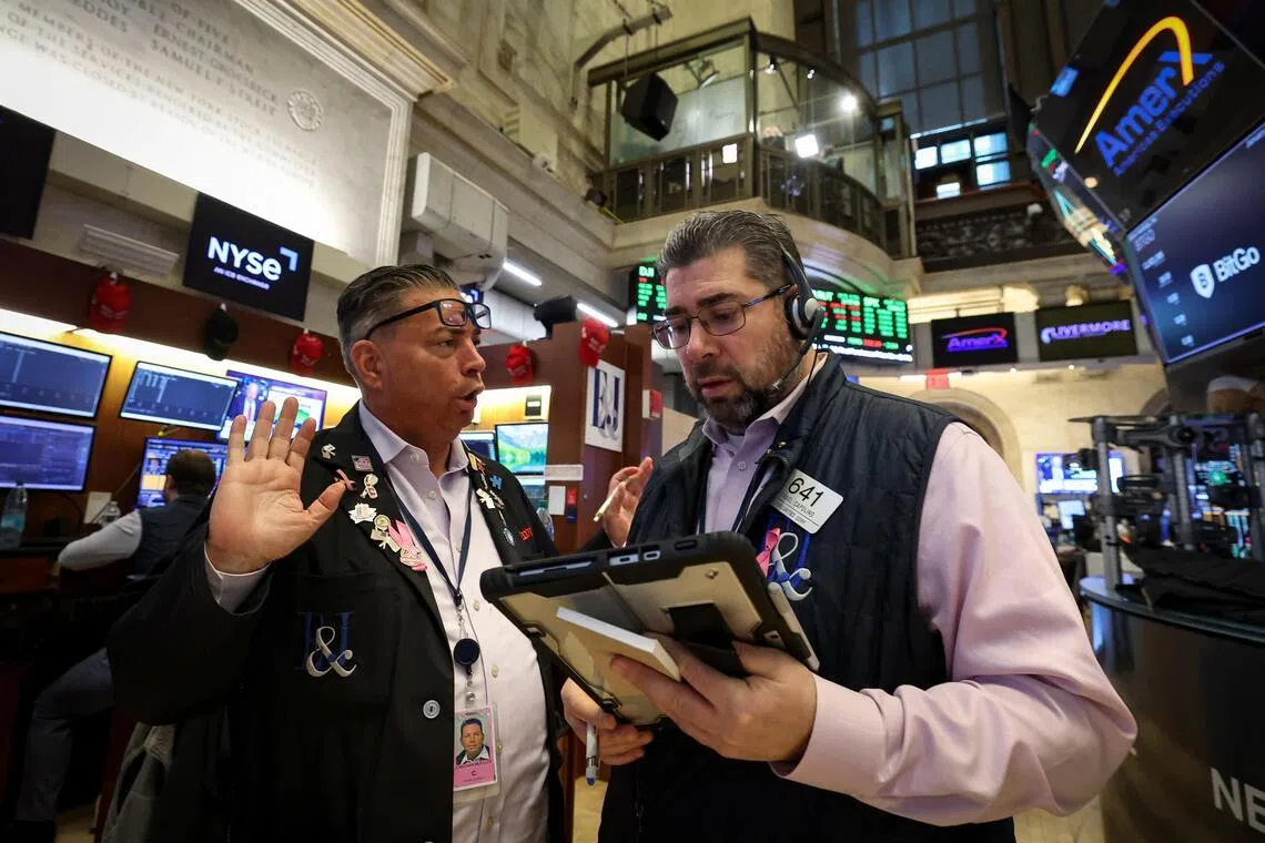 Traders working on the floor of the New York Stock Exchange, in New York City, on Jan 22.   