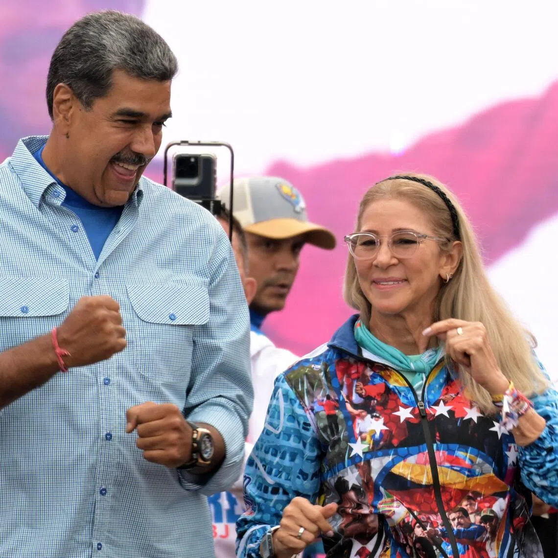 Ousted Venezuelan President Nicolas Maduro (left) and his wife, Cilia Flores, seen here in a 2024 photo, are scheduled to go on trial starting June 1, 2027.
