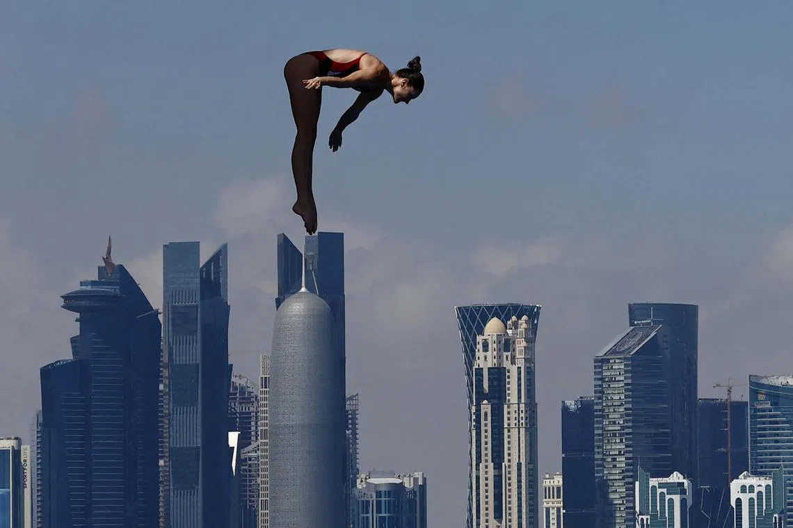 High Diving - World Aquatics Championships - Old Doha Port, Doha, Qatar - February 14, 2024 Canada's Jessica Macaulay in action during the women's 20m semi final REUTERS/Clodagh Kilcoyne