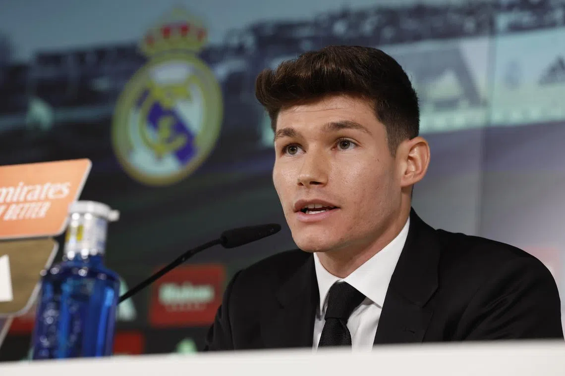 Real Madrid's Fran Garcia reacts during his presentation as a new player of the team.