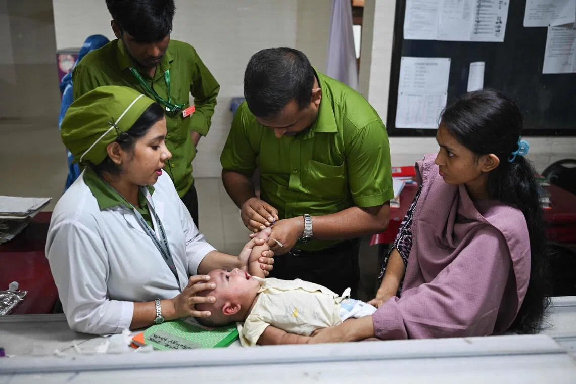 Bangladesh measles toll nears grim 1,000-child mark