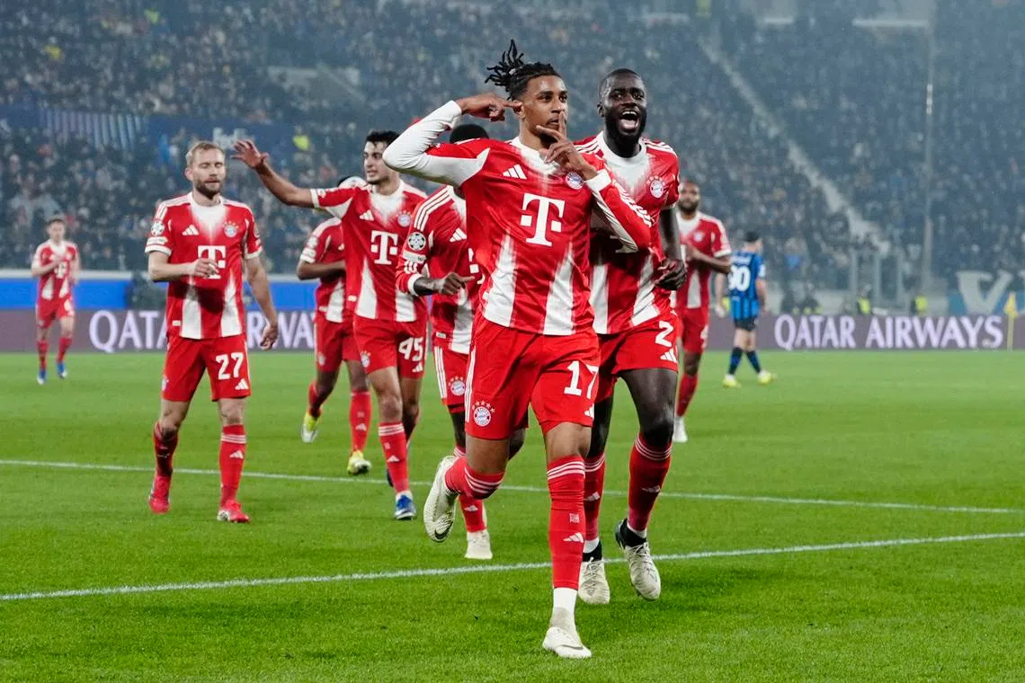 Soccer Football - UEFA Champions League - Round of 16 - First Leg - Atalanta v Bayern Munich - New Balance Arena, Bergamo, Italy - March 10, 2026 Bayern Munich's Michael Olise celebrates scoring their second goal REUTERS/Matteo Ciambelli